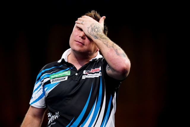 <p>2021 champion Gerwyn Price crashed out at the hands of Brendan Dolan </p>
