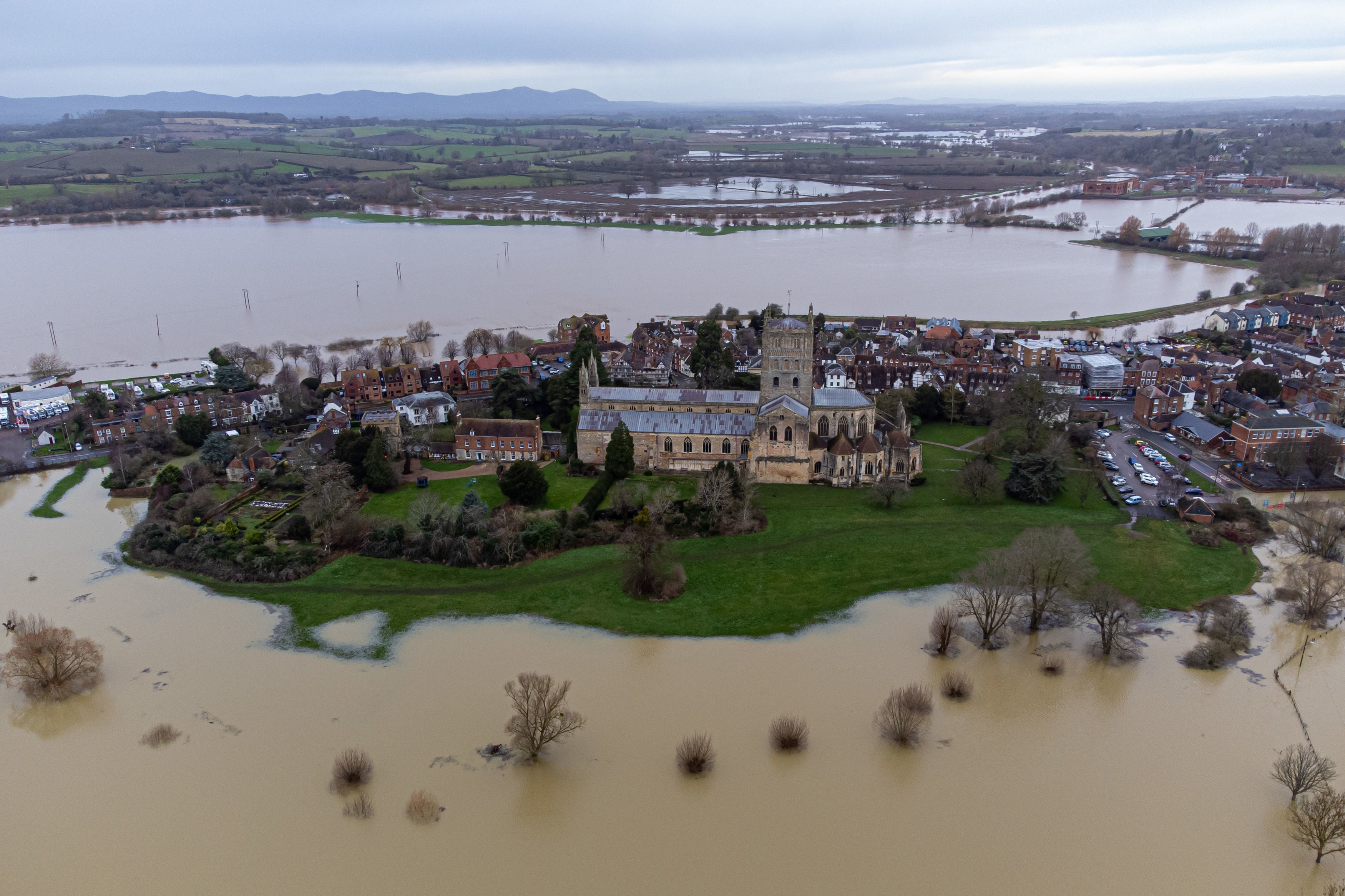 Flooding around Tewkesbury Abbey after heavy rain from Storm Gerrit