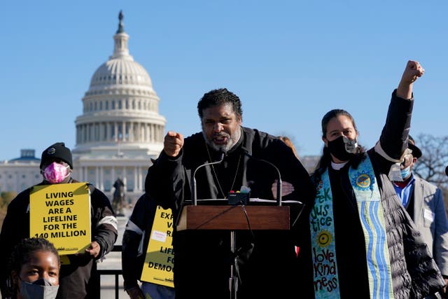 <p>Rev. William Barber is pictured at a rally outside the US Capitol in 2023. He was arrested inside the Capitol on Monday</p>