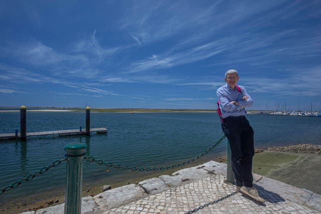 <p>Blue-sky thinking: Simon Calder on Portugal’s Algarve coast on 17 May 2021, the day international travel became legal again </p>