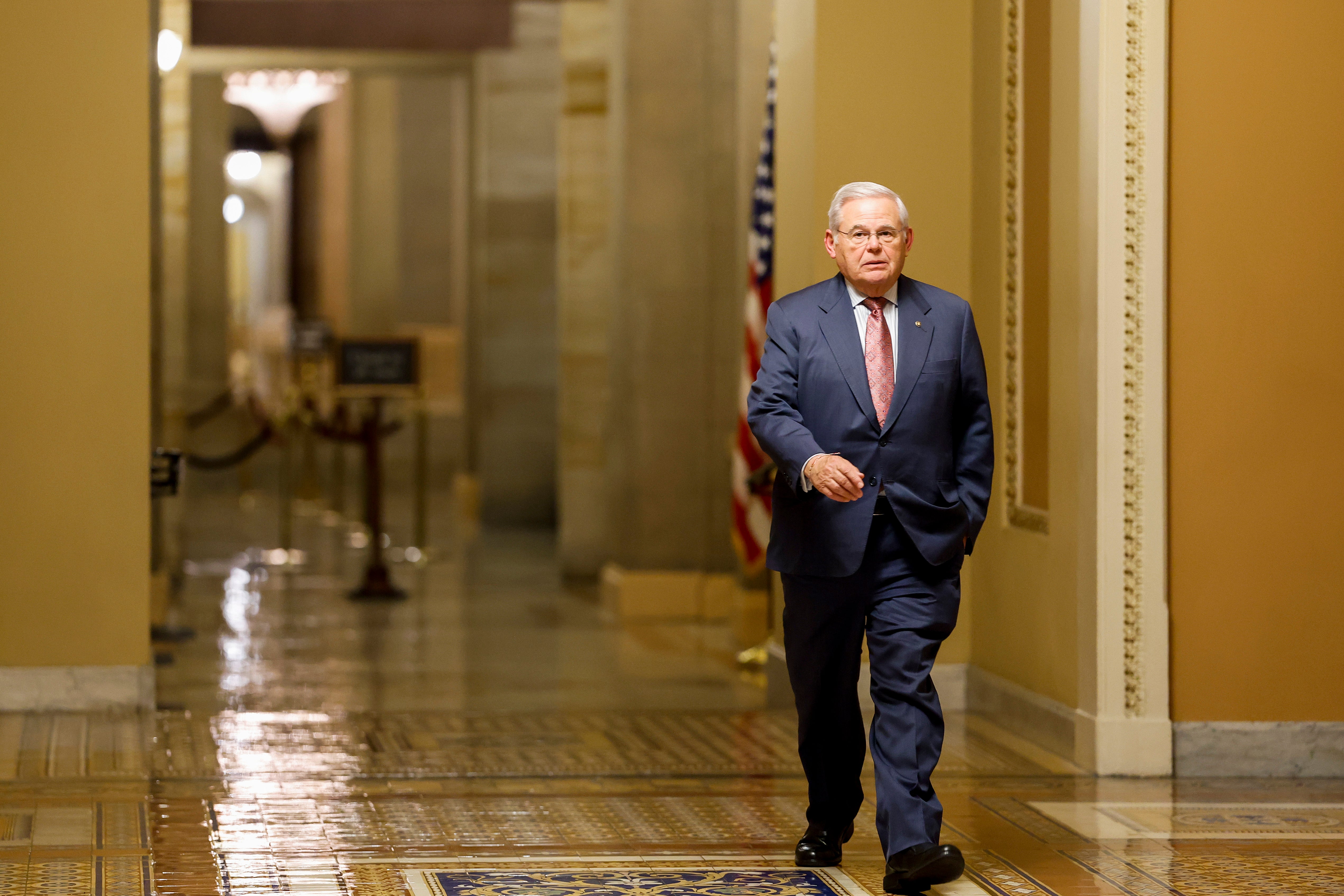 Senator Robert Menendez walks to the Senate Chambers in the US Capitol Building on 15 November 2023