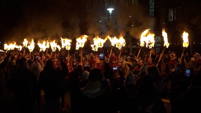 <p>Thousands of torches light Edinburgh streets kicking off Hogmanay celebrations.</p>