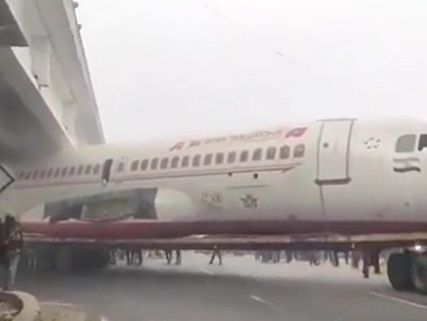 <p>Ex-Air India scrap plane gets stuck under bridge in Bihar, India </p>