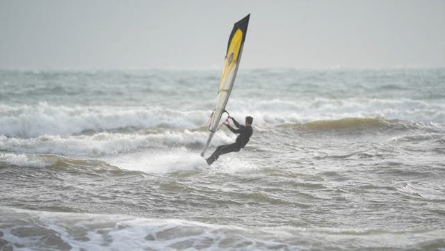 <p>Watch: People kite and windsurf on Avon Beach as Storm Gerrit hits UK.</p>