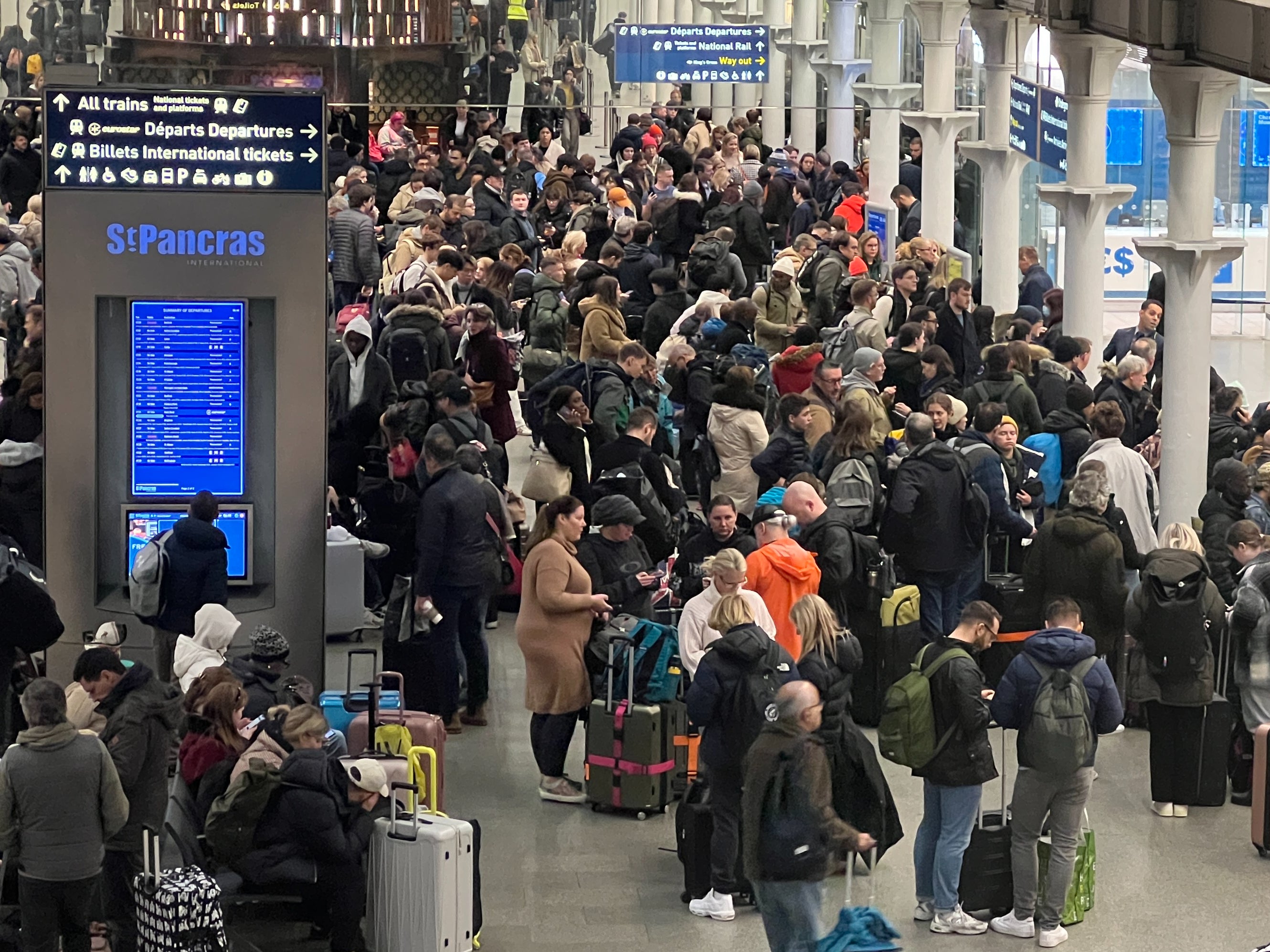 Waiting game: Eurostar passengers at London St Pancras International on Saturday 30 December, when all trains to Paris, Amsterdam and Brussels were cancelled
