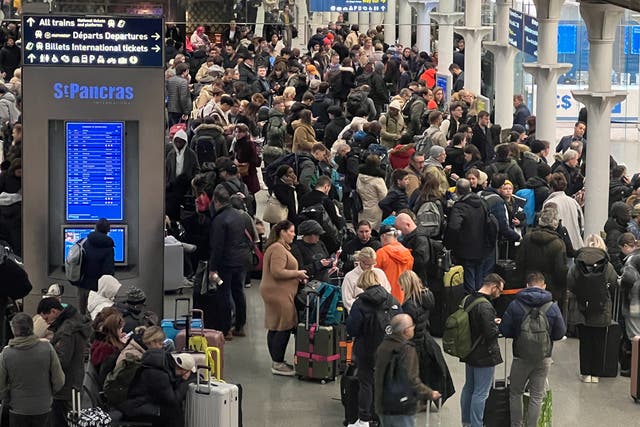 <p>Waiting game: Eurostar passengers at London St Pancras International on Saturday 30 December, when all trains to Paris, Amsterdam and Brussels were cancelled</p>
