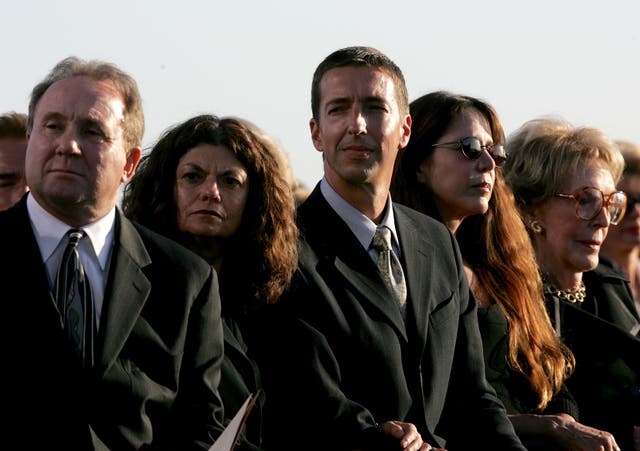 <p>Michael Reagan, his wife, Ron Reagan, Patti Davis and former first lady Nancy Reagan attend the interment ceremony as former President Ronald Reagan is laid to rest at the Ronald Reagan Presidential Library 11 June 2004 in Simi Valley, California</p>