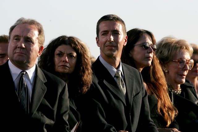 <p>Michael Reagan, his wife, Ron Reagan, Patti Davis and former first lady Nancy Reagan attend the interment ceremony as former President Ronald Reagan is laid to rest at the Ronald Reagan Presidential Library 11 June 2004 in Simi Valley, California</p>