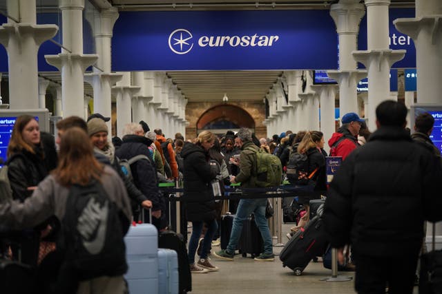 <p>Passengers in line at the Eurostar terminal in St Pancras International station, central London (Yui Mok/PA)</p>