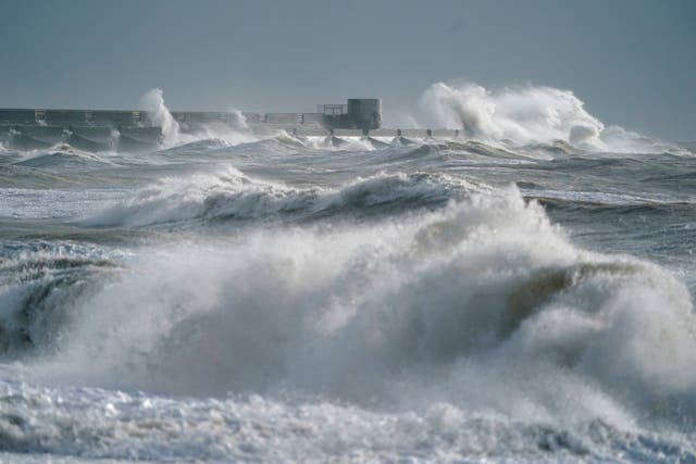 <p>Waves crash in to the shoreline in Brighton, East Sussex. </p>