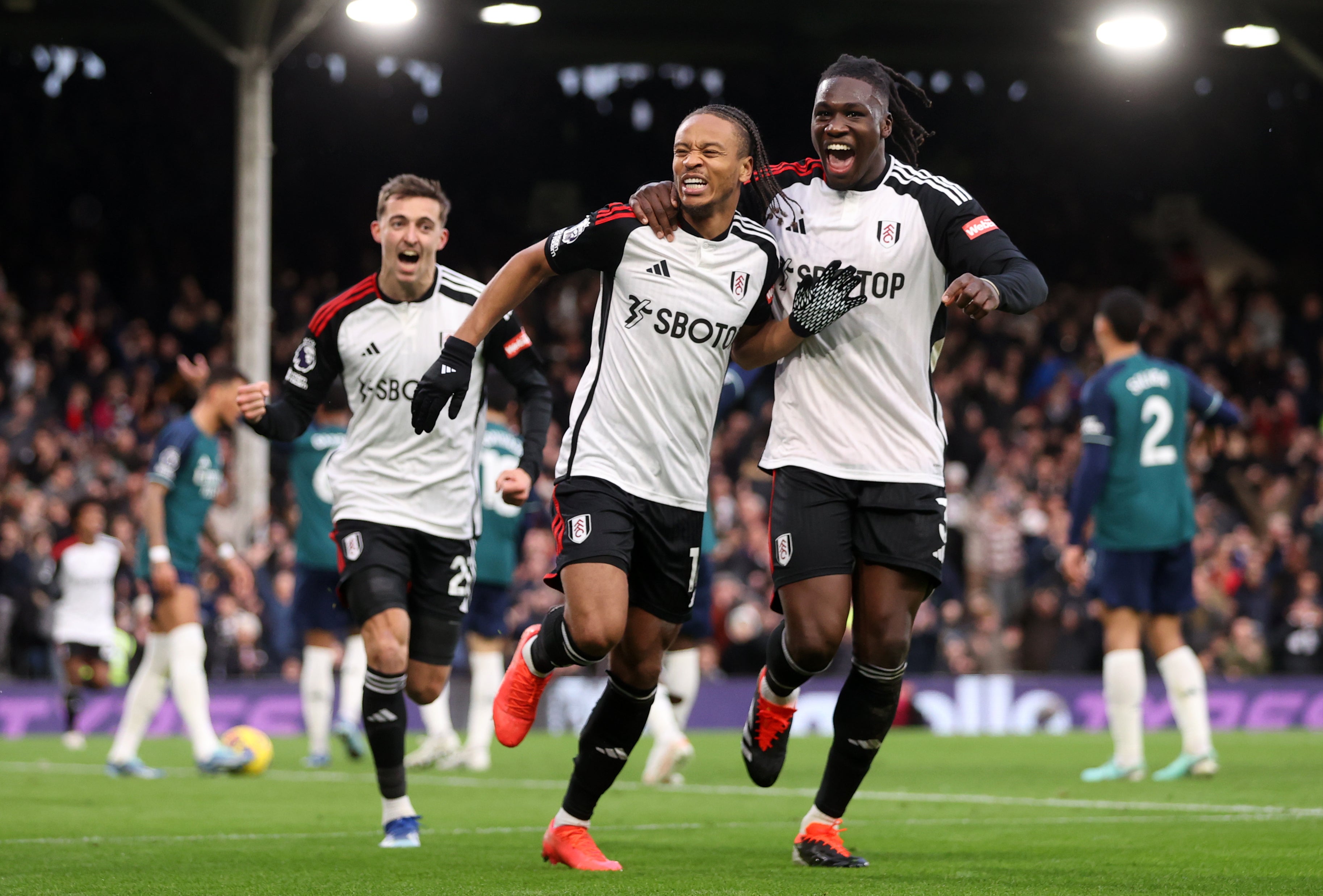 Bobby De Cordova-Reid, left, celebrates with Calvin Bassey after scoring Fulham’s winning goal