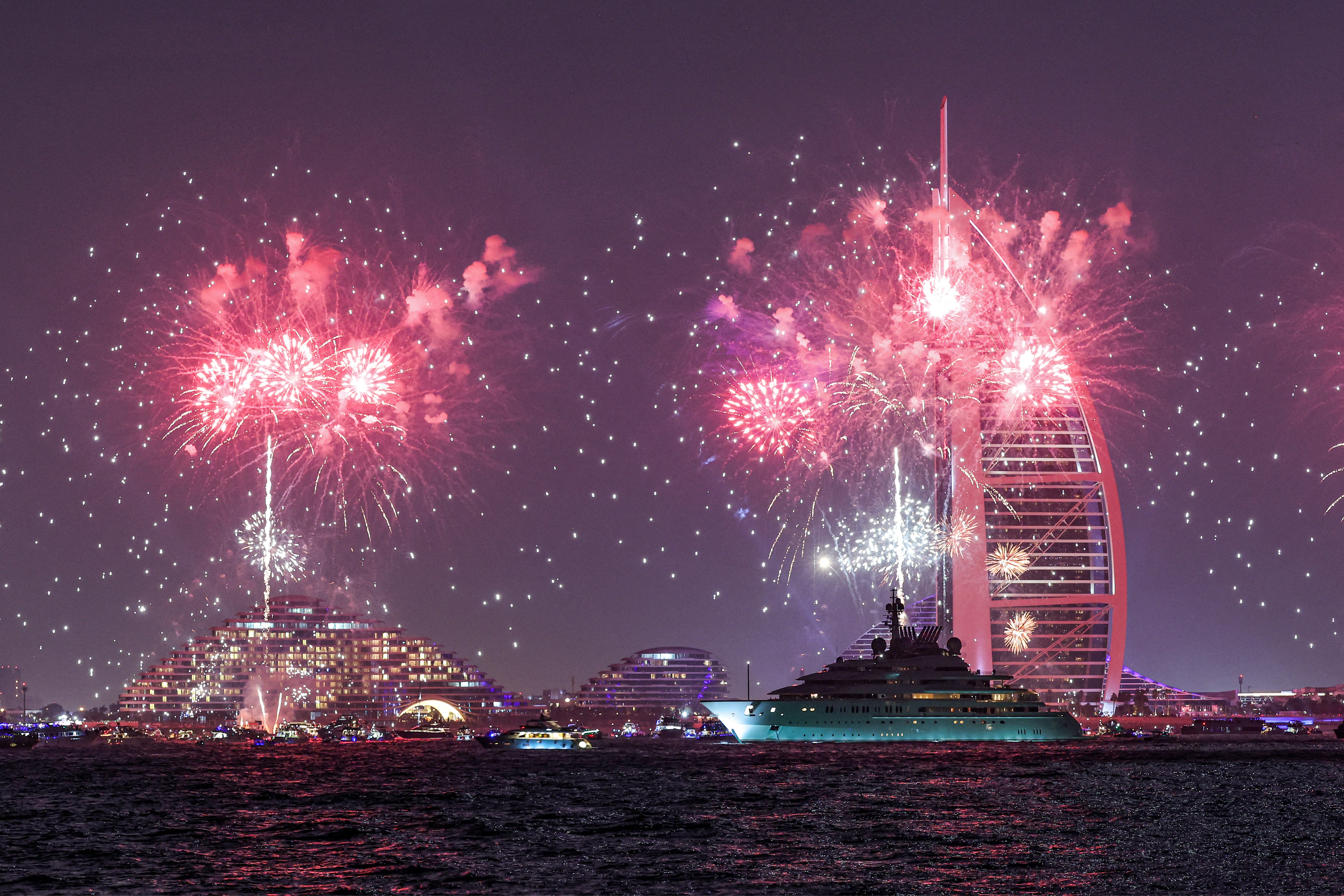 Fireworks light up the sky at the landmark Burj al-Arab luxury hotel tower in Dubai