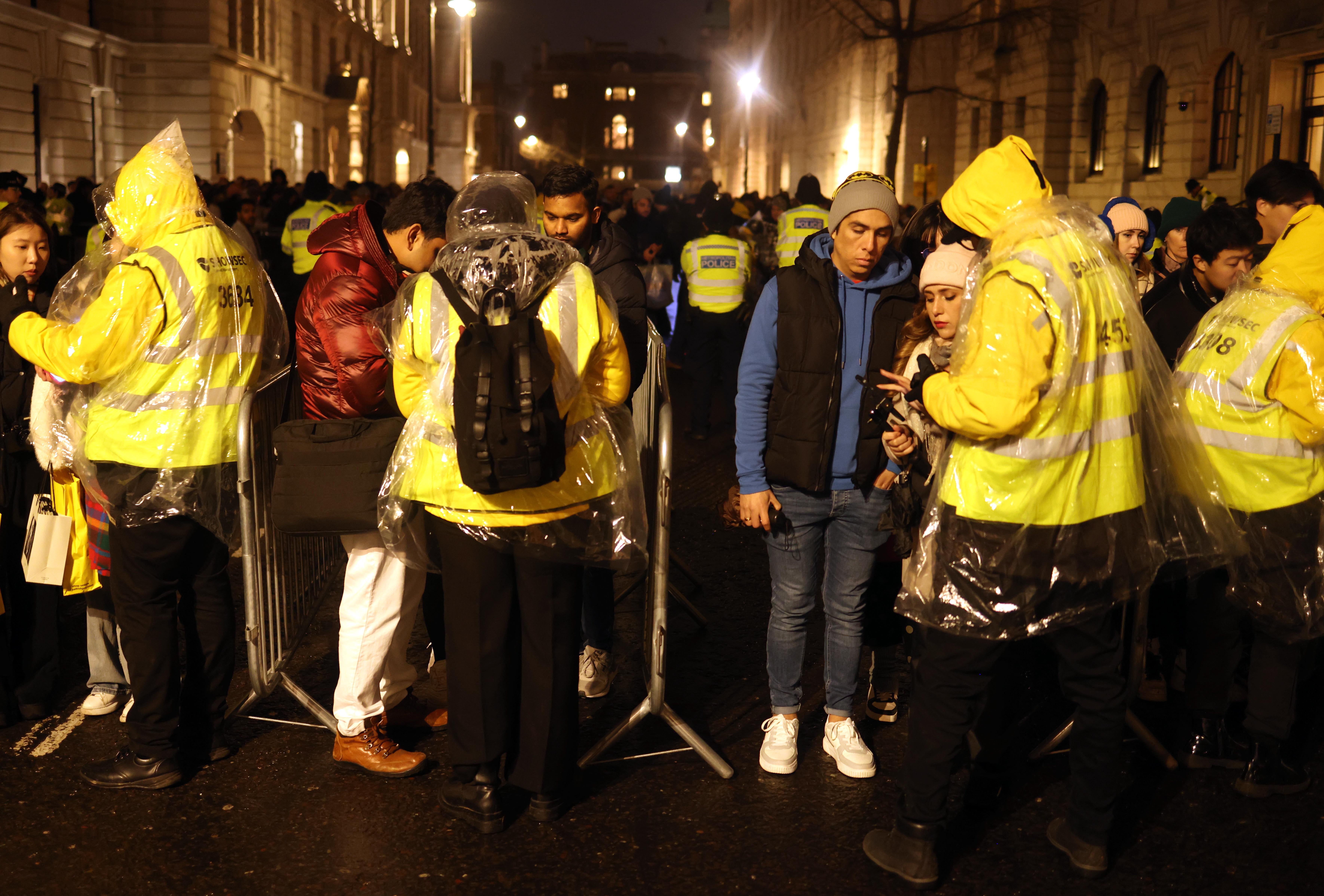 Security teams check tickets for viewing platforms with the event sold out