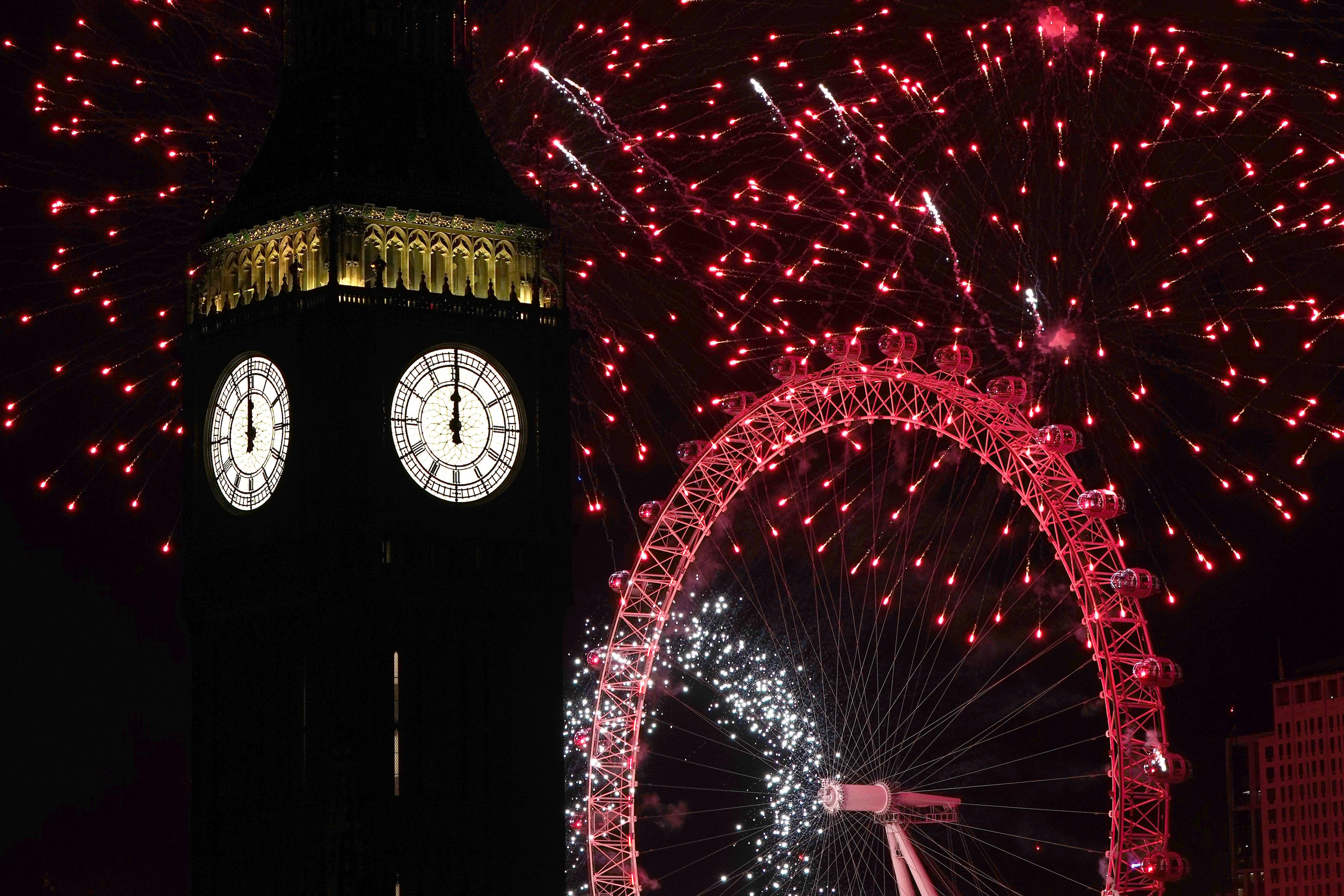 Fireworks light up the sky over the London Eye in central London (Aaron Chown/PA)