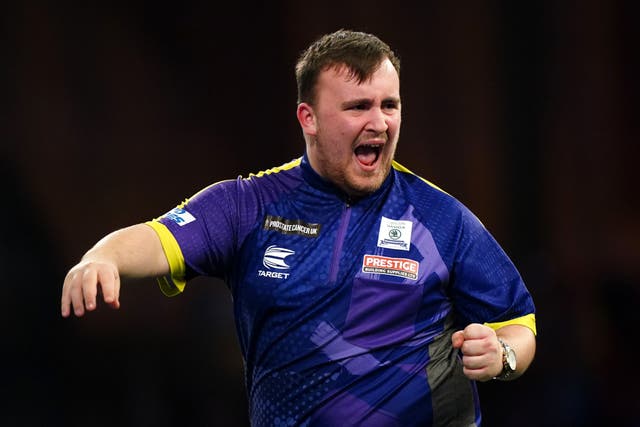 Luke Littler is through to the semi-final of the World Championship on debut (Zac Goodwin/PA)