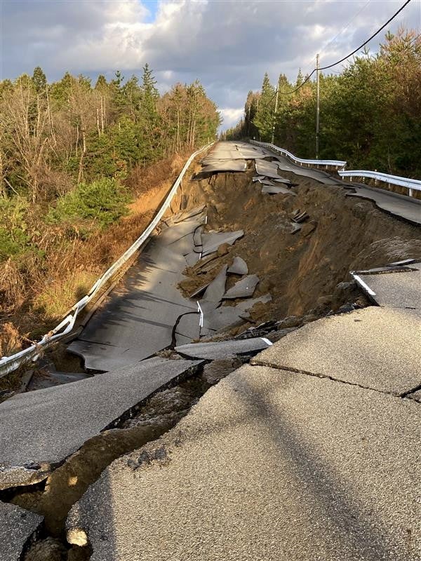 A view of a road collapsed by strong earthquakes in Shika, central Japan