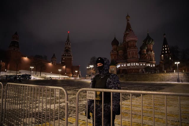 <p>Law enforcement officers guard the closed Red Square during the New Year’s Eve celebrations in downtown Moscow</p>