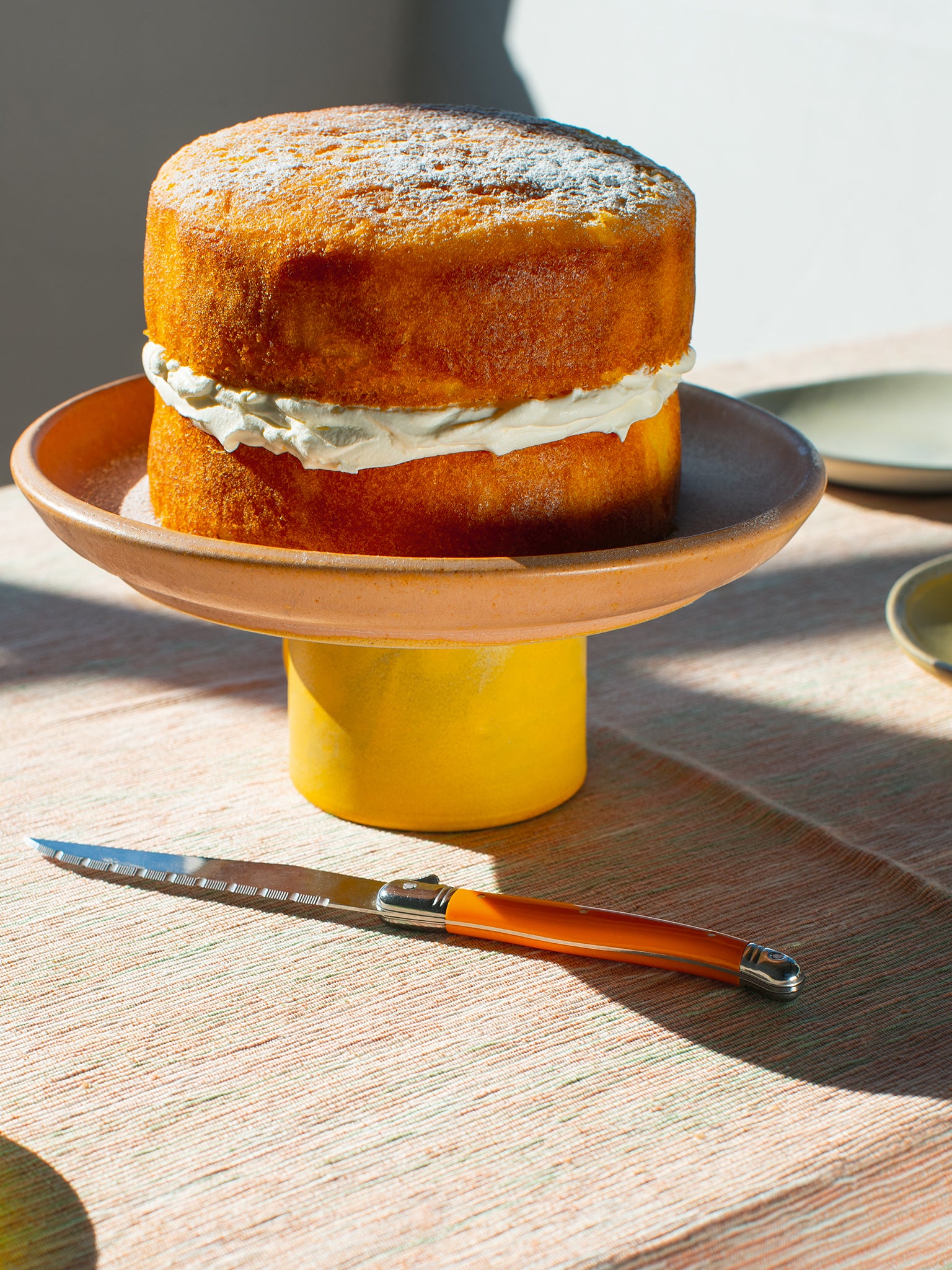 Victoria sponge meets lemon drizzle with this easy, citrusy bake