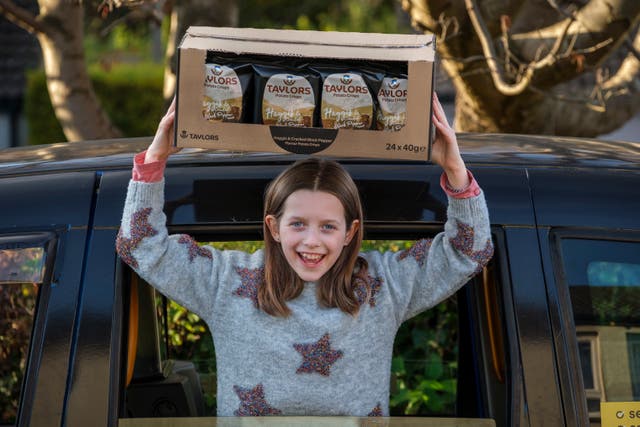 <p>Grace, 10, was rewarded with a taxi full of her favourite crisps </p>