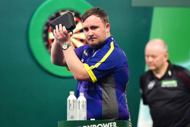 Luke Littler celebrates victory (Zac Goodwin/PA)