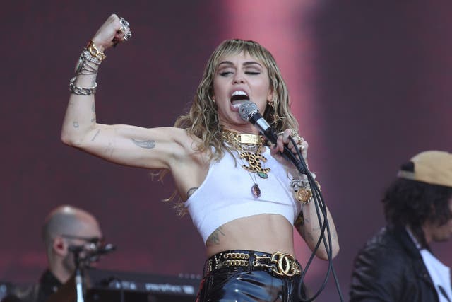 Miley Cyrus’s viral hit Flowers held the top spot for 10 weeks (Yui Mok/PA)