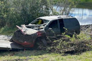 Multiple found by divers inside car in Florida pond | The Independent