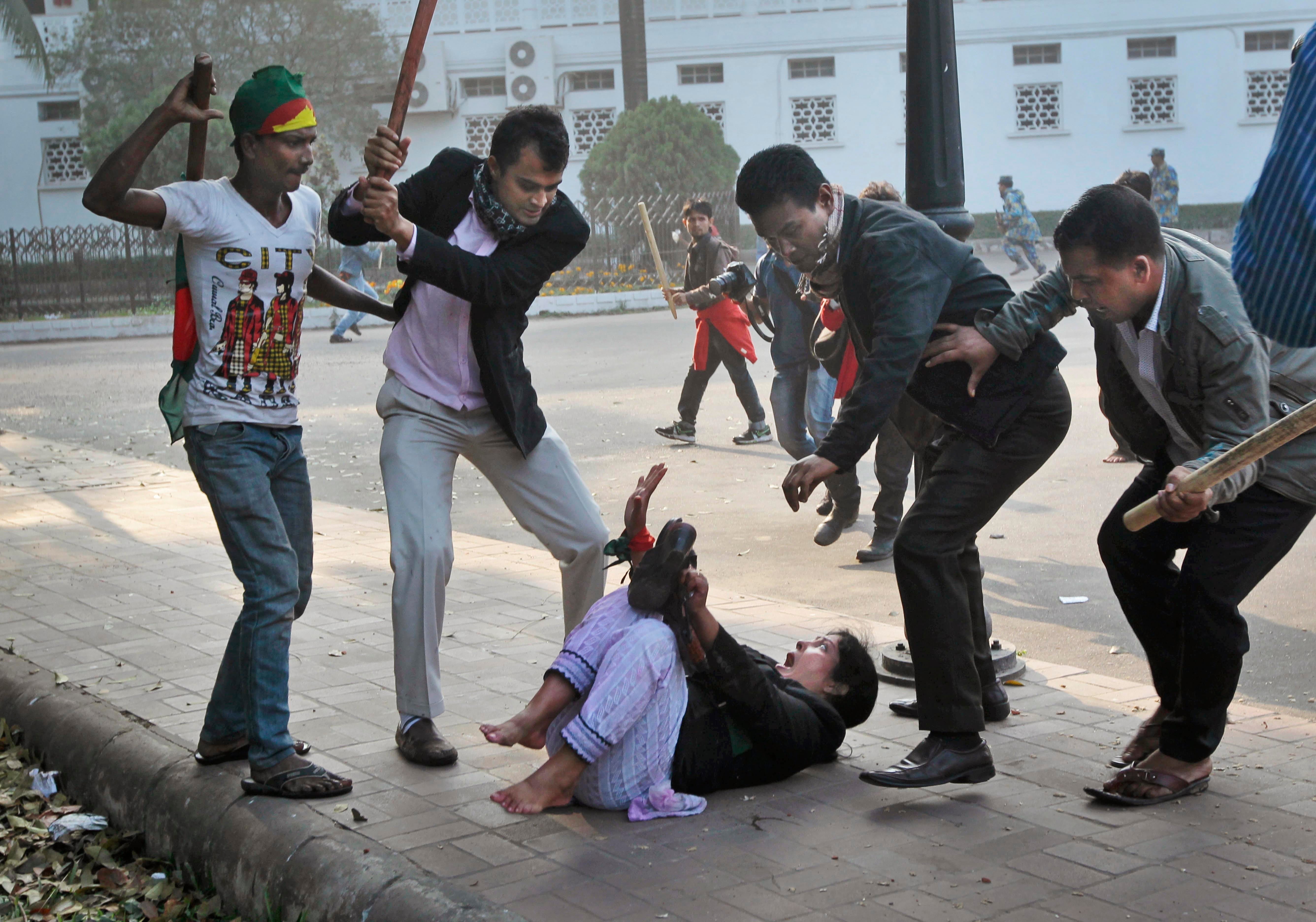 Supporters of the ruling Bangladesh Awami League beat a lawyer and supporter of the main opposition Bangladesh Nationalist Party (BNP)