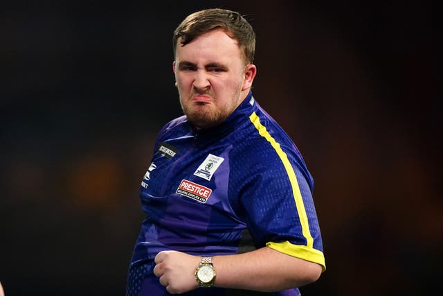 Luke Littler celebrates during his match against Rob Cross (Zac Goodwin/PA)