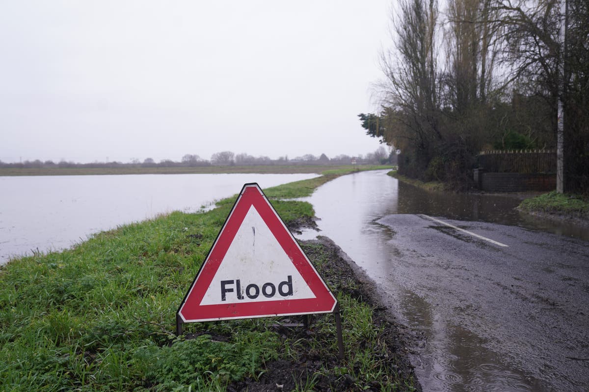 Sewage spills on to public path as treatment works overwhelmed by flood water