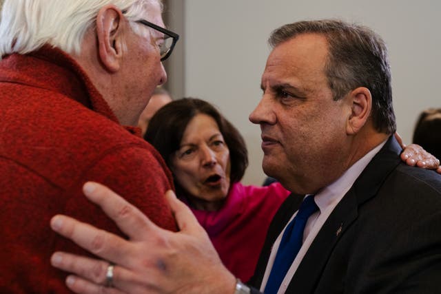 <p>Republican presidential candidate former New Jersey Gov. Chris Christie greets a supporter after speaking during a "Tell It Like It Is" town hall at the Bedford Event Center on December 19, 2023 in Bedford, New Hampshire</p>
