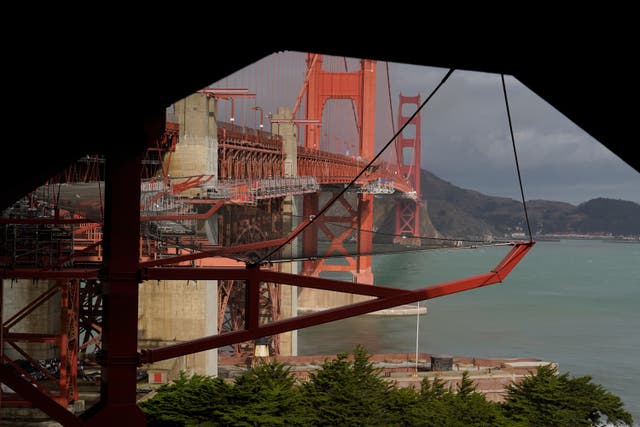 <p>A suicide deterrent net is seen under construction on the Golden Gate Bridge in San Francisco, Wednesday, Dec. 6, 2023. The barrier at the bridge is near completion more than a decade after officials approved it. (AP Photo/Eric Risberg)</p>