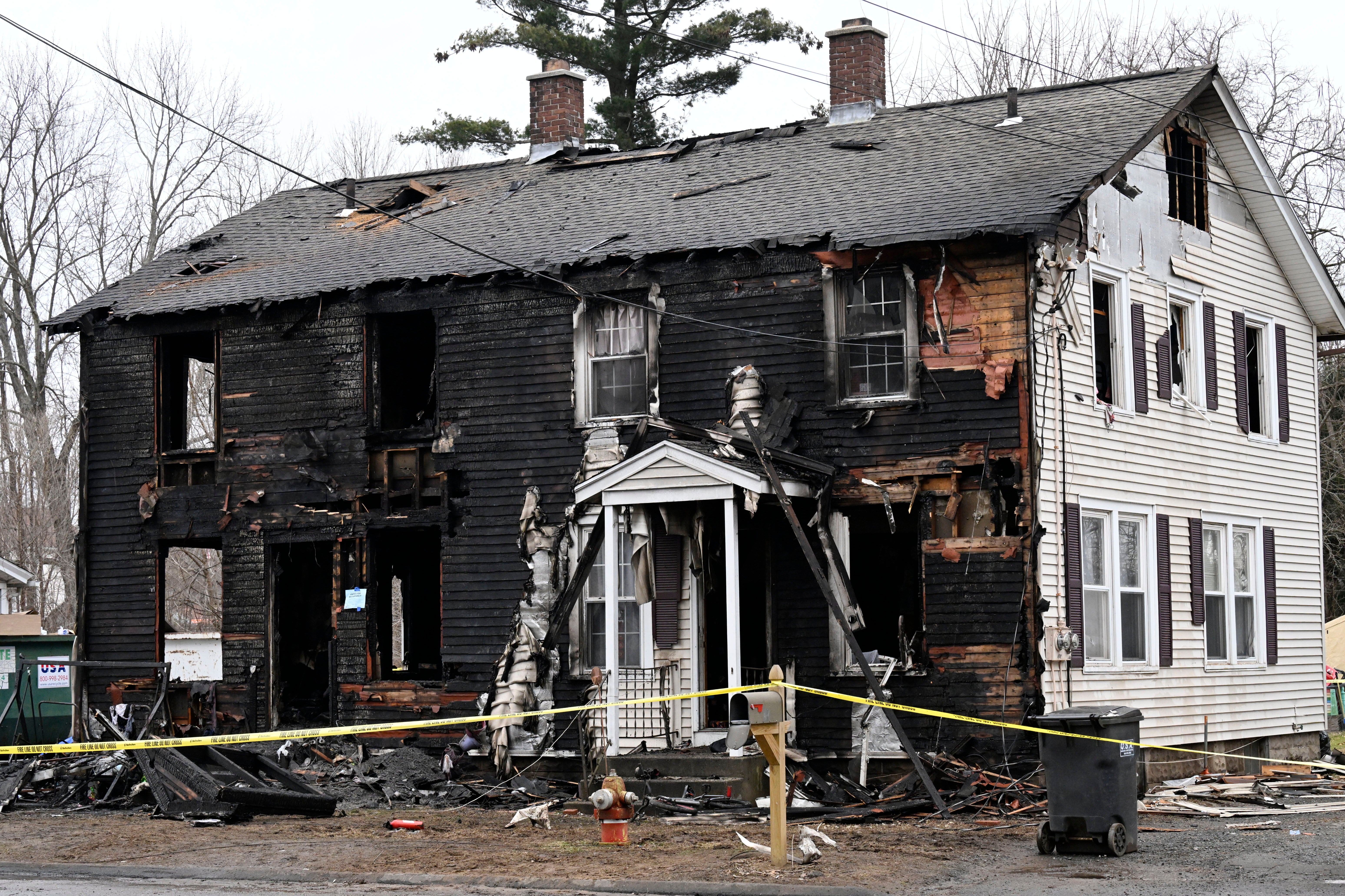 Four children died after a house fire broke out in the Somers, Connecticut duplex pictured above