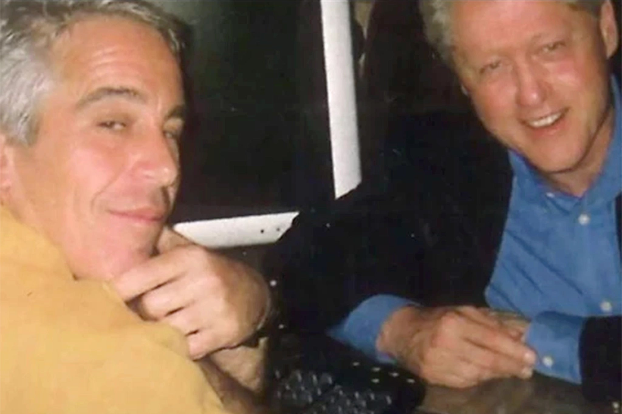 <p>Jeffrey Epstein, left, is pictured with former U.S. President Bill Clinton in this undated photo.</p>