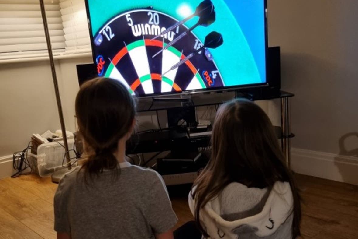 Polly Edwards, left, and Lyla Edwards enjoy the darts (Adam Edwards)