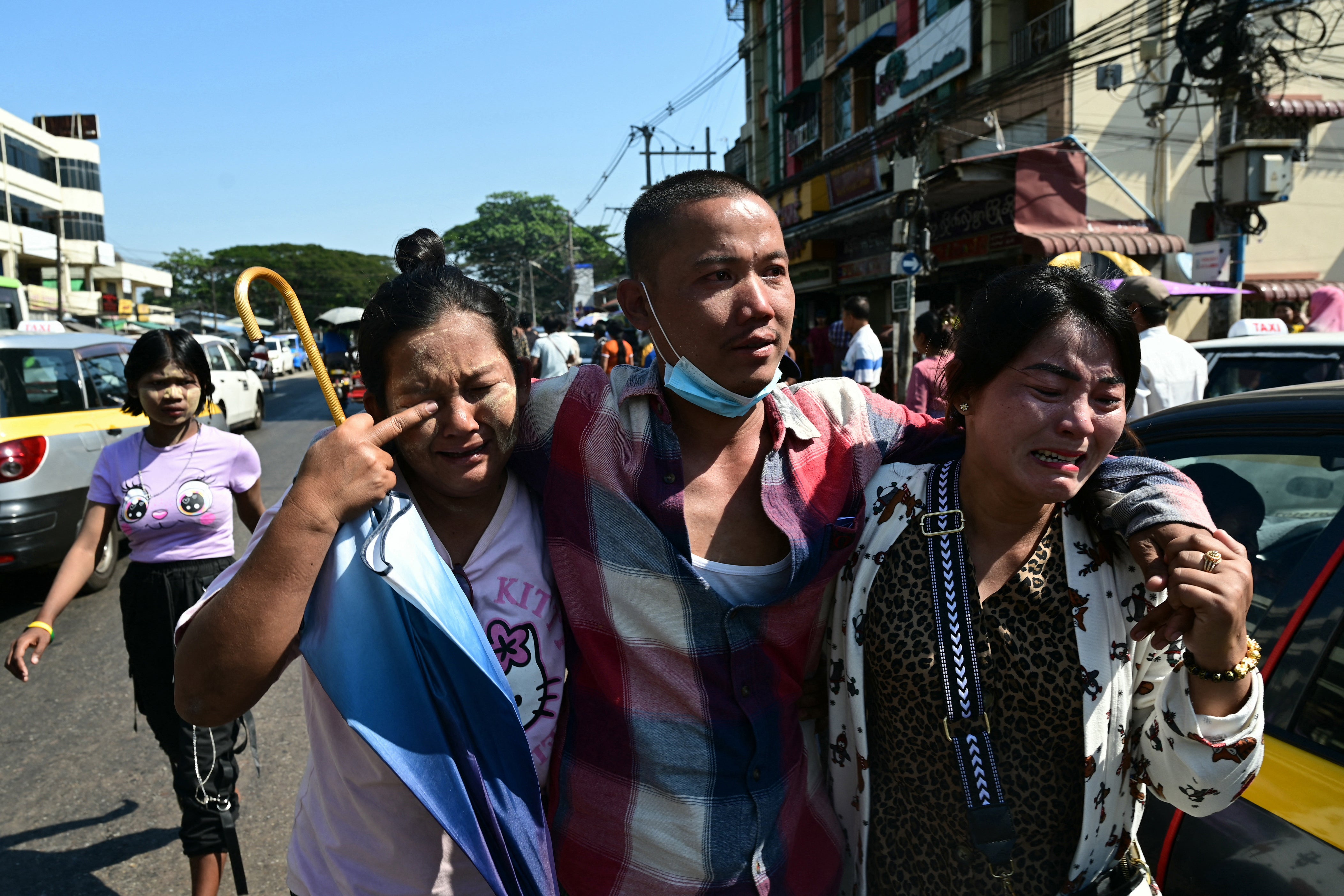 Relatives celebrate with a released prisoner outside Insein prison on Myanmar's Independence Day in Yangon