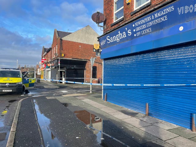 <p>Sangha’s newsagent in Liverpool, where shots were reported from on Wednesday </p>