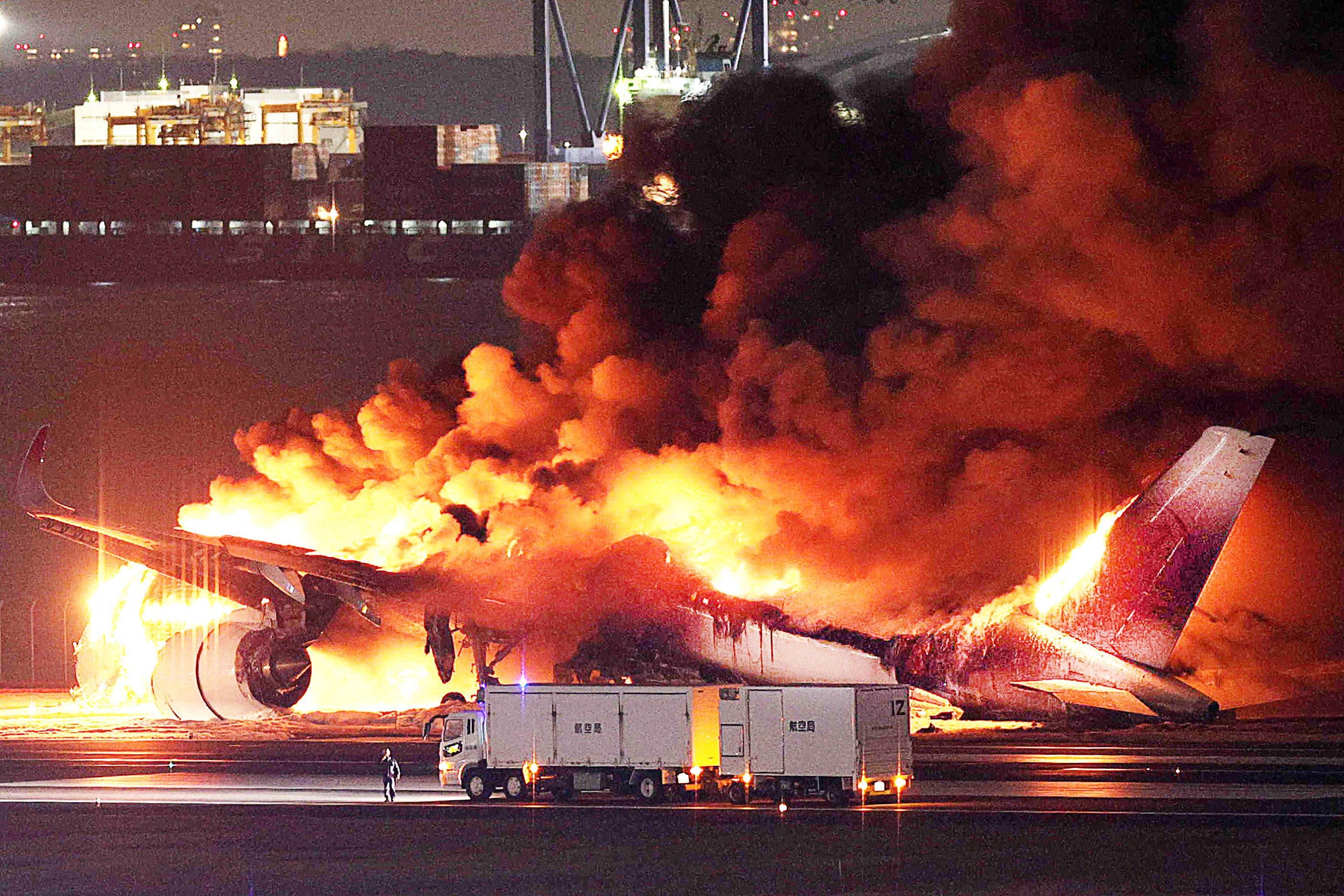 Scenes from the Japan airport crash