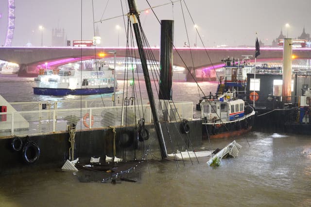 The mast of the Bar & Co boat, which was moored at Temple Pier (James Manning/PA)