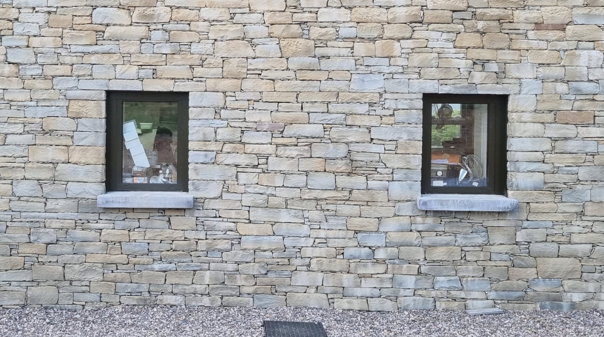 Used items stacked in windows greet guests on first entering the hotel