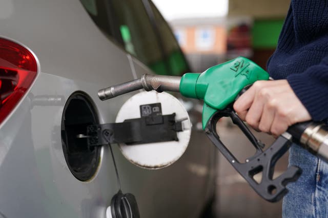 Drivers benefited from a 6p per litre fall in petrol prices last month, new figures show (Joe Giddens/PA)