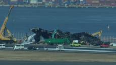 Watch: Japan aircraft wreckage to be removed following airport collision