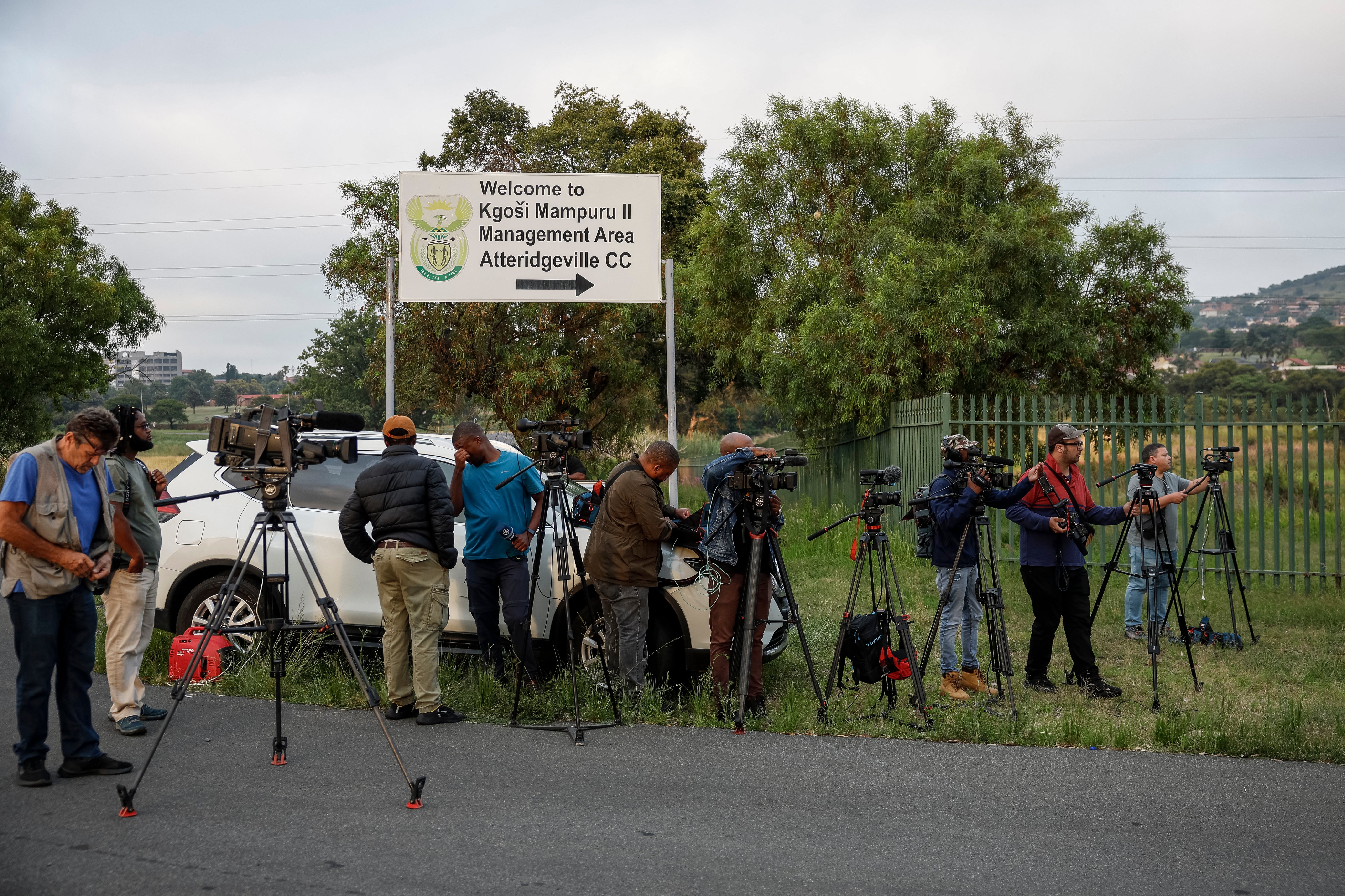 Journalists set up at the entrance of the Atteridgeville Correctional Centre in Pretoria on 5 January 2024