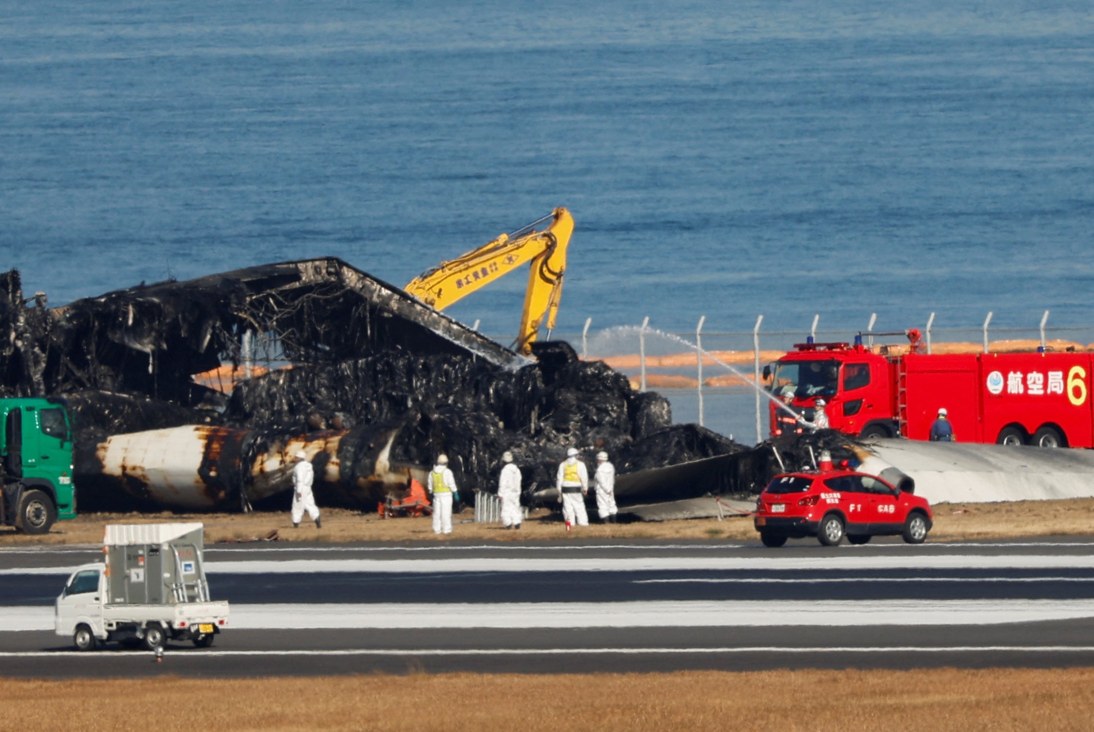 The passenger jet continued for 1km along the runway, in flames and with 367 passengers on board