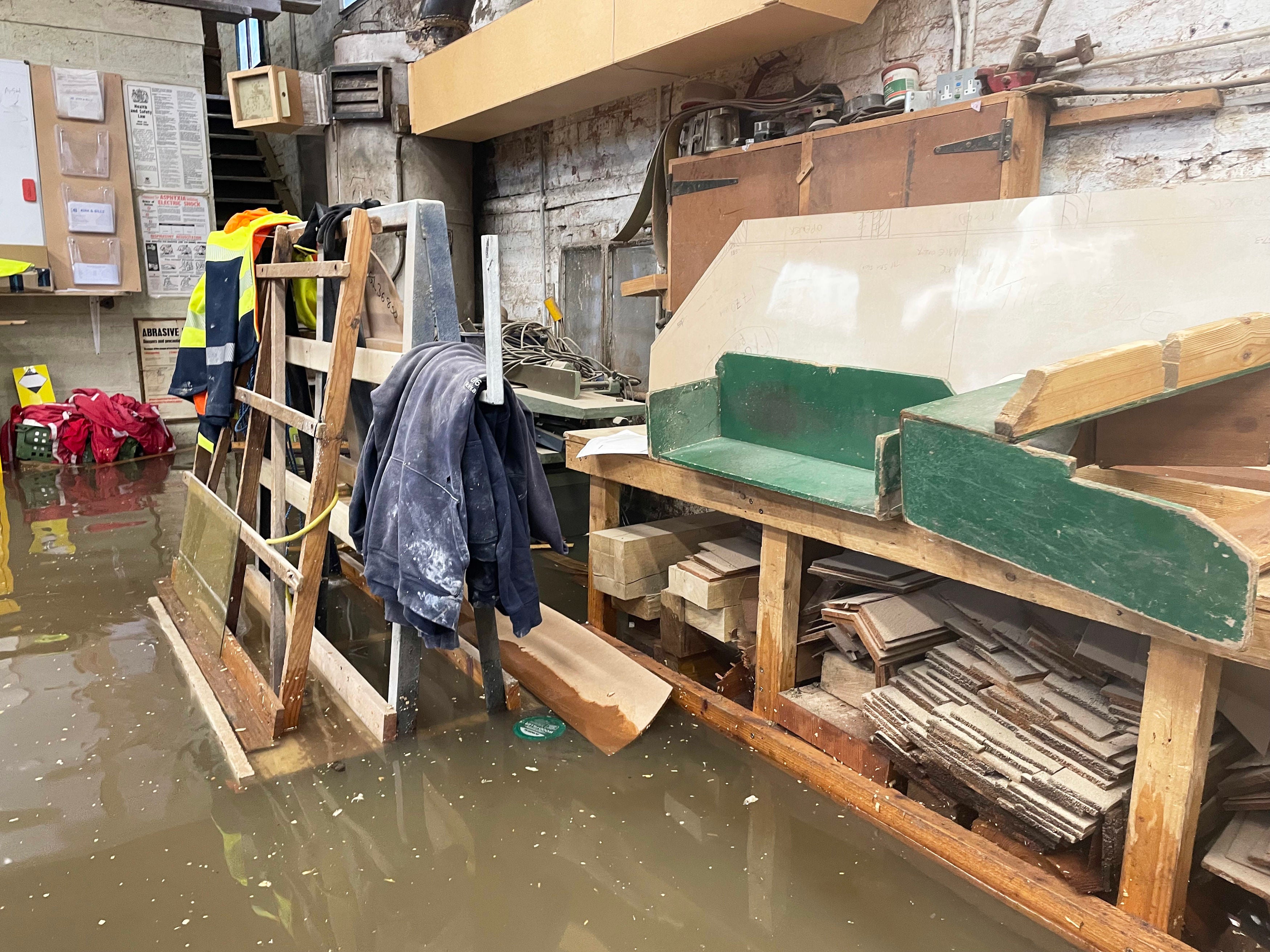Flood water inside Kirk and Bill's, a furniture workshop in Newark-on-Trent, Nottinghamshire