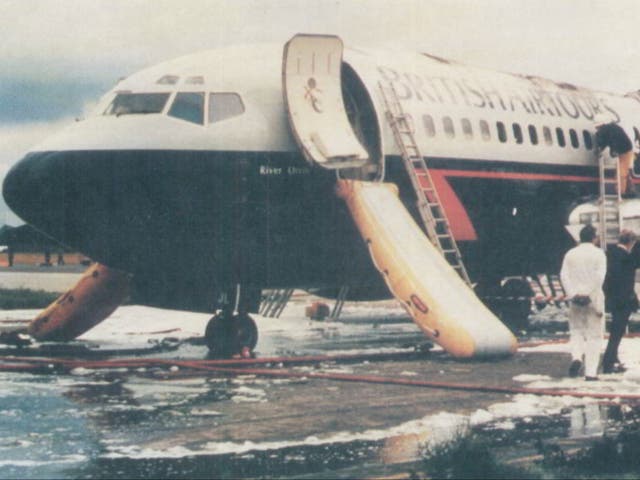 <p>Scene of tragedy: the British Airtours Boeing 737 in which 55 people died at Manchester airport</p>