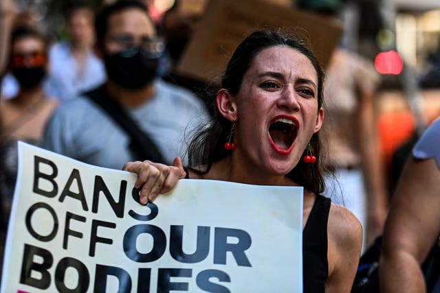 <p>Abortion rights activists rally after the US Supreme Court striked down the right to abortion, in Miami, Florida, in June 2022</p>