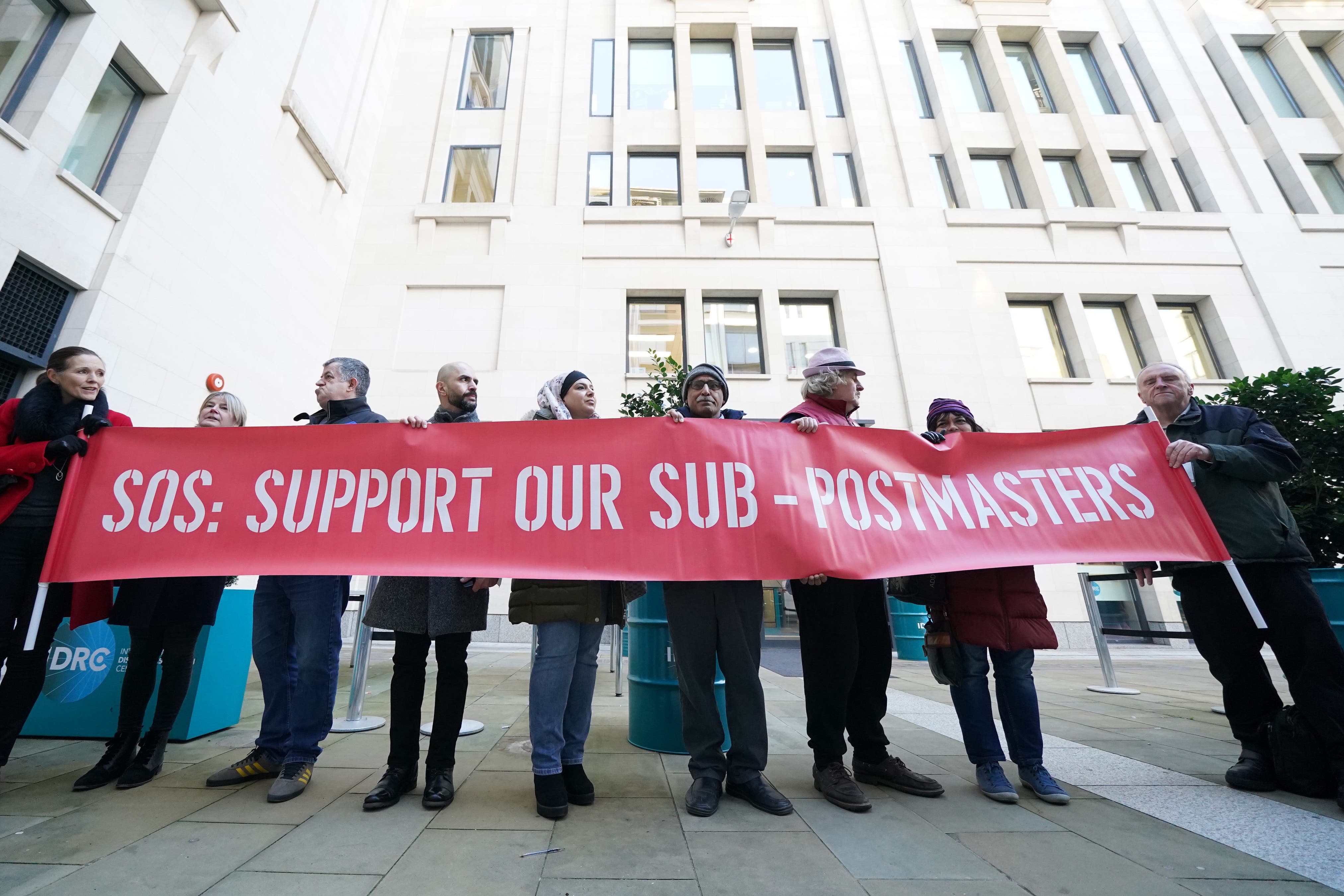 Protesters outside a hearing of the Post Office Horizon IT inquiry