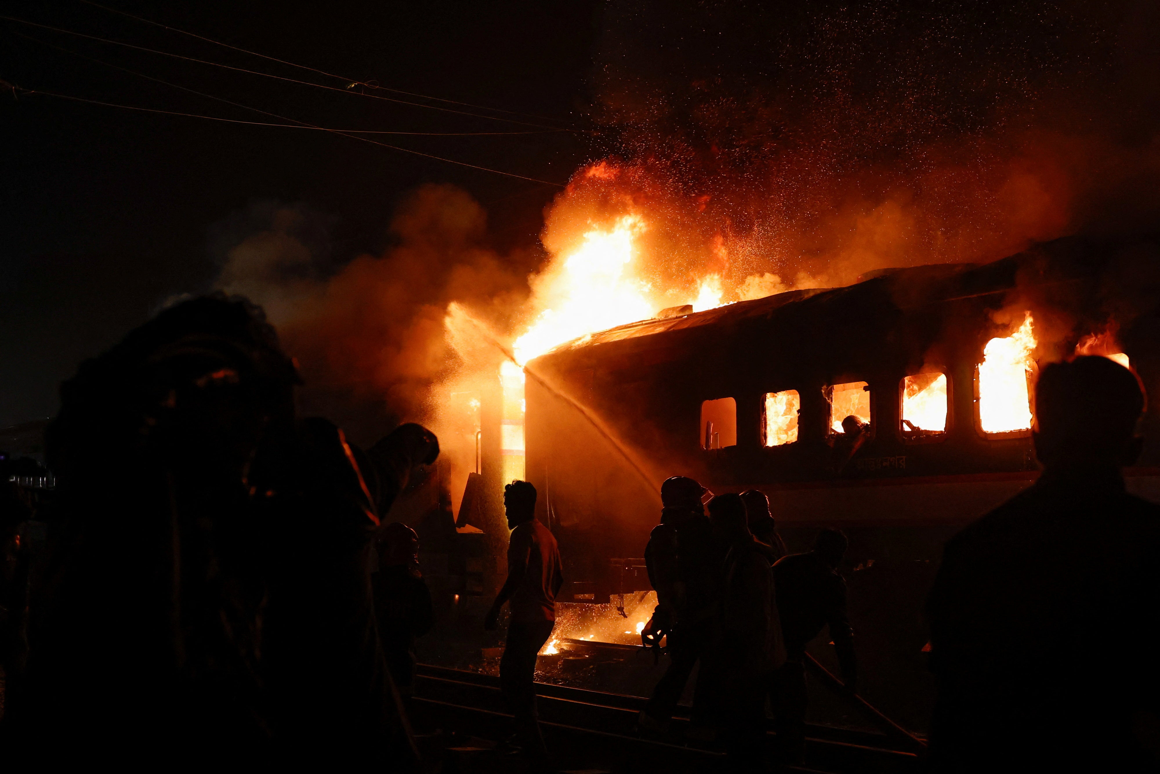 Four people were killed when a passenger train caught fire in the capital in ‘an act of sabotage’ ahead of the election