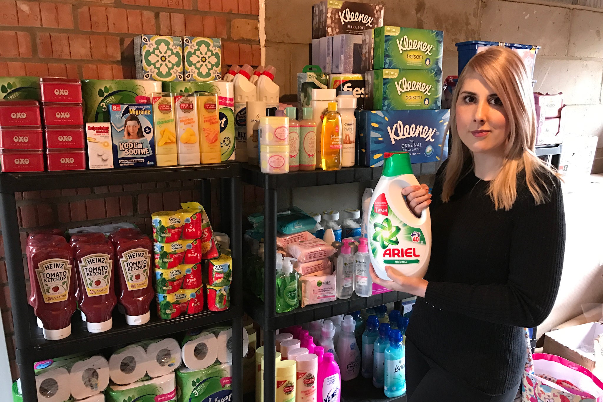 Holly Jay-Smith, whose Facebook group ‘Extreme Coupons and Bargains’ has 2.4 million members, pictured with her stockpile of non-perishables