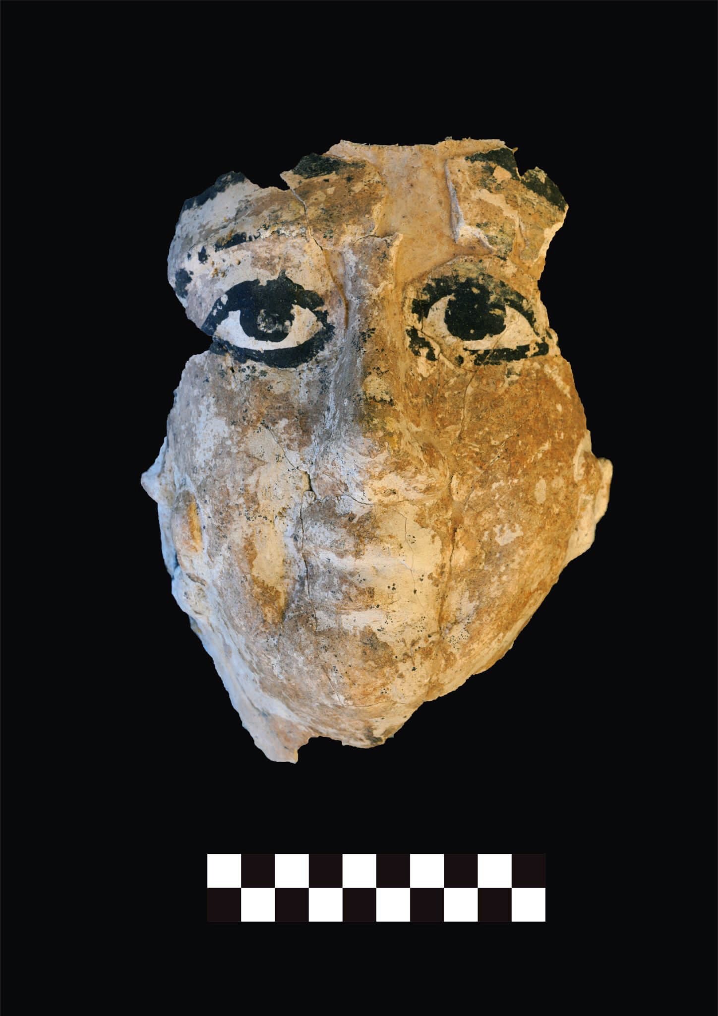 A coloured mask found at a burial site in Saqqara, Giza Governorate, Egypt.